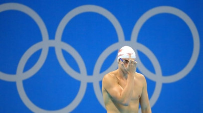 meet the olympic swimmer who flips off his dad before every race
