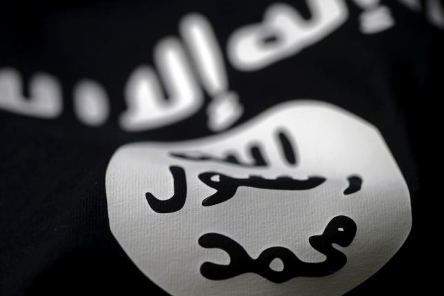an islamic state flag is seen in this picture illustration taken february 18 2016 photo reuters