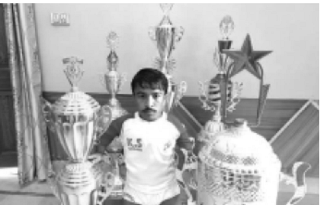 chotu wrestler flaunts his trophies won during different competitions photo file