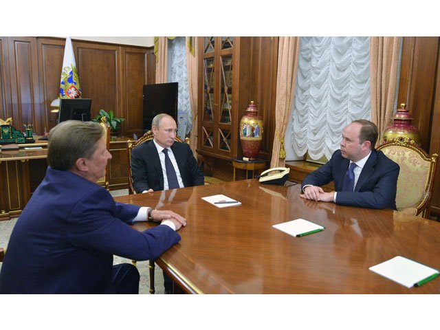 russian president vladimir putin c speaks with the newly appointed chief of staff of the presidential executive office anton vaino r and the newly appointed presidential representative for environmental management ecology and transport sergei ivanov l during their meeting at the kremlin in moscow on august 12 2016 photo afp