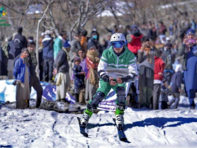 a player is skiing during the snow festival in chitral photo express a player is skiing during the snow festival in chitral photo express