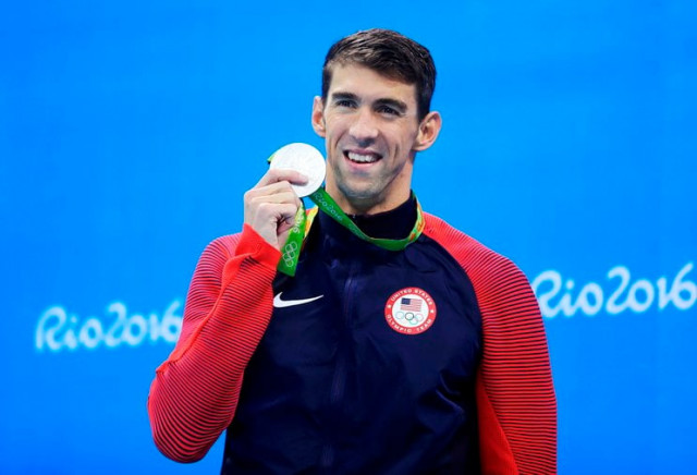 michael phelps usa of usa poses with his silver medal during victory ceremony of men 039 s 100m butterfly at olympic aquatics stadium rio de janeiro brazil on august 12 2016 photo reuters michael phelps usa of usa poses with his silver medal during victory ceremony of men 039 s 100m butterfly at olympic aquatics stadium rio de janeiro brazil on august 12 2016 photo reuters