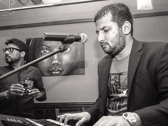 ilyas teaches music at various schools in singapore photo file ilyas teaches music at various schools in singapore photo file