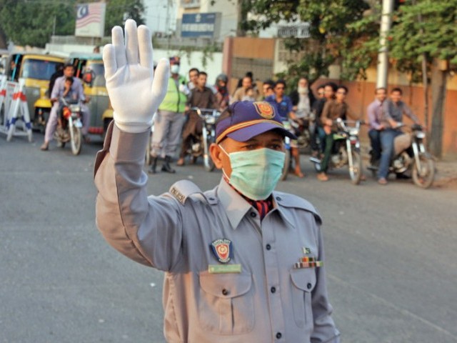 a traffic police officer photo athar khan express