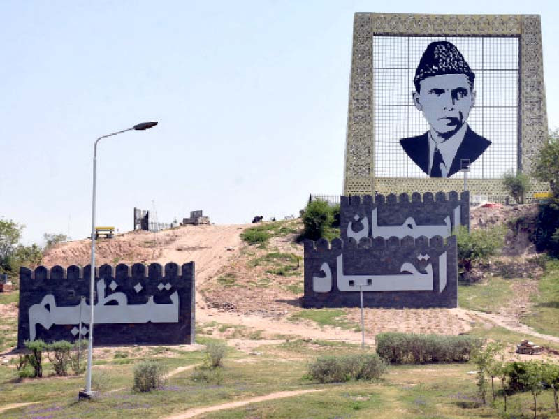 the recently installed portrait of the founder of the nation in islamabad is being cordoned off to avoid any damage to the structure photo online