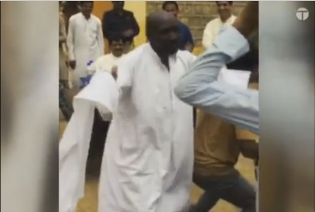 screen grab of the video shows a prisoner dancing to celebrate independence day