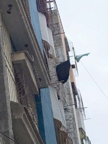the house of muhammad abrar 28 once used to fly the national flag this sunday a black flag was hung from its window as part of his family mourning the death of their beloved son photo express the house of muhammad abrar 28 once used to fly the national flag this sunday a black flag was hung from its window as part of his family mourning the death of their beloved son photo express