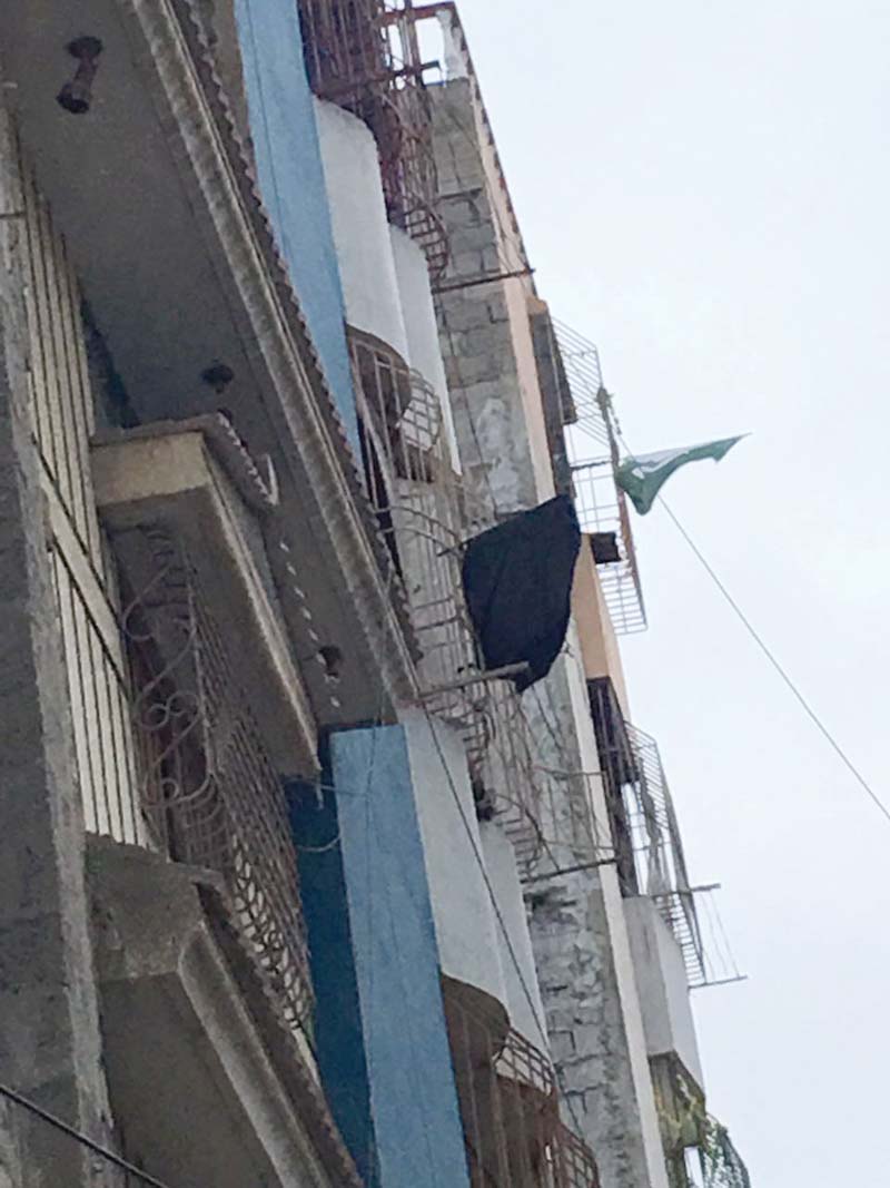 the house of muhammad abrar 28 once used to fly the national flag this sunday a black flag was hung from its window as part of his family mourning the death of their beloved son photo express