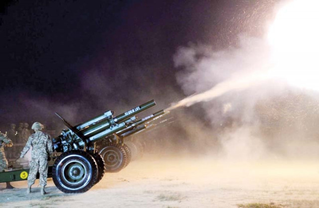 the day started with a 21 gun salute top a man takes his children home after buying them flags and badges right photo express the day started with a 21 gun salute top a man takes his children home after buying them flags and badges right photo express