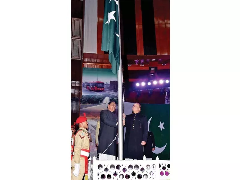 president mamnoon and pm nawaz hoist the national flag at the convention centre photo inp president mamnoon and pm nawaz hoist the national flag at the convention centre photo inp