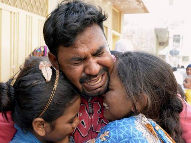 relatives of the person killed in deadly attack on gulshan e iqbal park lahore photo inp