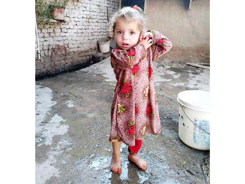 an afghan girl at her house in peshawar a house where a family of refugees live photo express