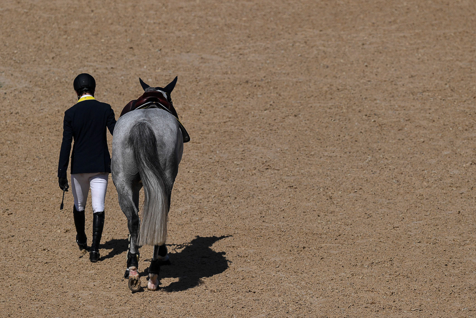 italy 039 s cassio rivetti leaves after falling during the equestrian 039 s jumping individual and team qualifier event of the rio 2016 olympic games at the olympic equestrian centre in rio de janeiro photo afp