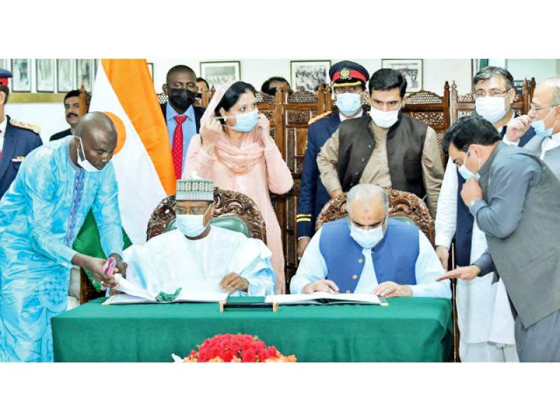 national assembly speaker asad qaiser and president of national assembly of niger seini oumarou sign an mou photo express