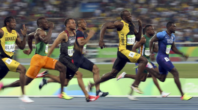 in pictures bolt makes olympic history with 100 metre triumph in pictures bolt makes olympic history with 100 metre triumph