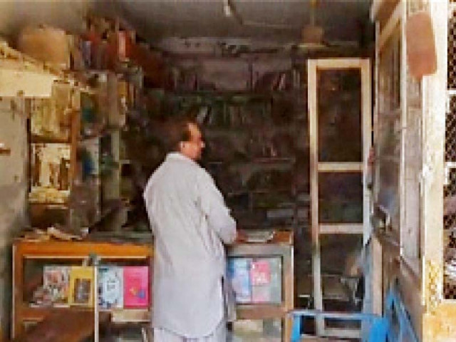 the librarian attends a phone call to answer queries of people regarding availability of books photo express the librarian attends a phone call to answer queries of people regarding availability of books photo express