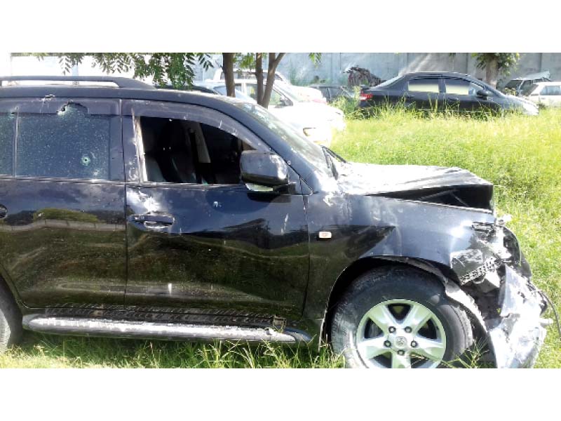 the vehicle in which fahad malik and tariq malik were travelling when they were attacked is parked at the shalimar police station photo arsalan altaf express