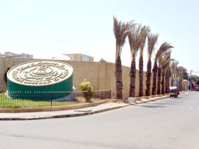 the emblem of provincial assembly of sindh shines on a sunny day on the road leading to the main gate of the assembly building photo express