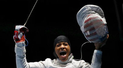 the first american olympian to compete in a hijab wins a bronze medal the first american olympian to compete in a hijab wins a bronze medal