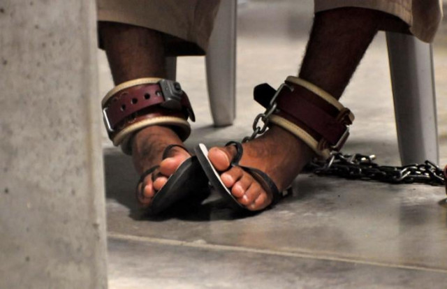 in this photo reviewed by a us department of defense official a guantanamo detainee 039 s feet are shackled to the floor as he attends a 039 life skills 039 class inside the camp 6 high security detention facility at guantanamo bay us naval base april 27 2010 photo reuters in this photo reviewed by a us department of defense official a guantanamo detainee 039 s feet are shackled to the floor as he attends a 039 life skills 039 class inside the camp 6 high security detention facility at guantanamo bay us naval base april 27 2010 photo reuters