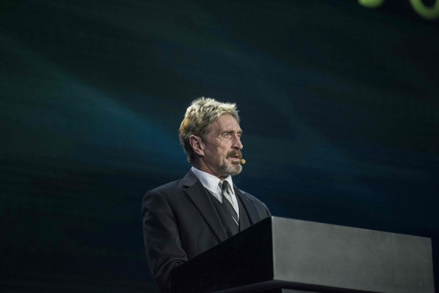 john mcafee founder of the eponymous anti virus company speaks during the china internet security conference in beijing photo afp john mcafee founder of the eponymous anti virus company speaks during the china internet security conference in beijing photo afp