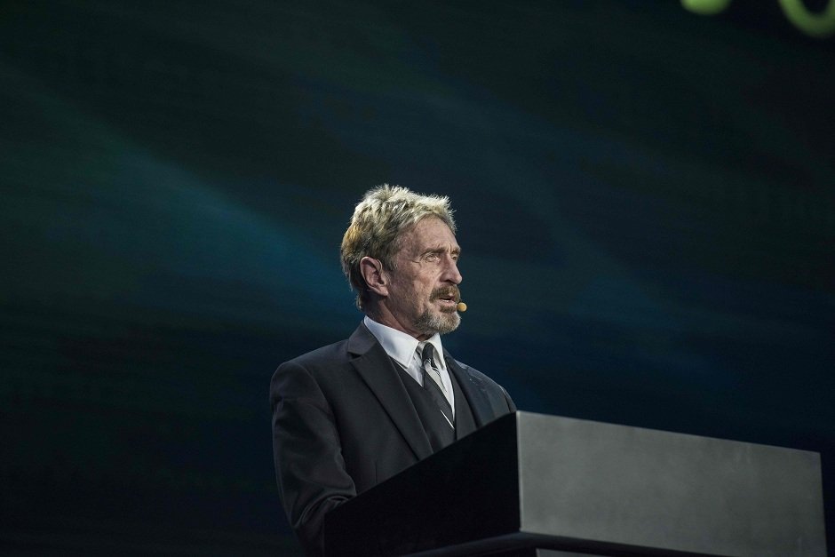 john mcafee founder of the eponymous anti virus company speaks during the china internet security conference in beijing photo afp
