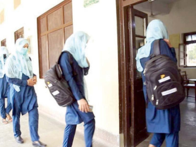girls walk into their classroom at an afternoon school in lahore photo express girls walk into their classroom at an afternoon school in lahore photo express
