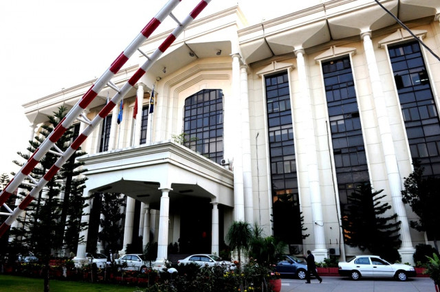the government says that it wants to promote investments and collect due share of taxes from the real estate sector photo afp the government says that it wants to promote investments and collect due share of taxes from the real estate sector photo afp