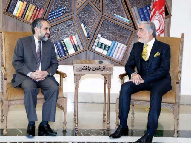 pakistan s ambassador to afghanistan abrar hussain is seen with afghanistan s chief executive dr abdullah abdullah photo afghan ceo office