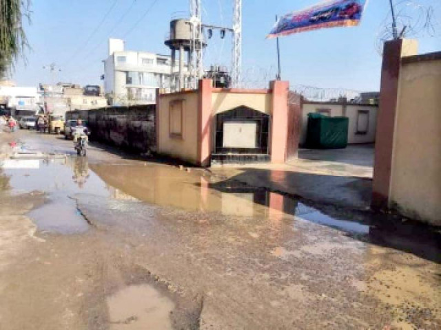 a road within plain sight of the dc office presents a sorry picture due to the presence of various ditches and standing water photos express a road within plain sight of the dc office presents a sorry picture due to the presence of various ditches and standing water photos express