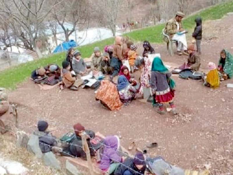 students at government masjid primary school balgaran have no choice but to sit on the ground to study in the freezing cold photo express