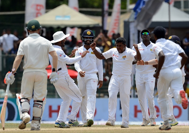 sri lanka 039 s rangana herath 2l celebrates with teammates after he dismissed australia 039 s adam voges during the final day of the third and final test cricket match between sri lanka and australia at the sinhalese sports club ssc ground in colombo on august 17 2016 photo afp