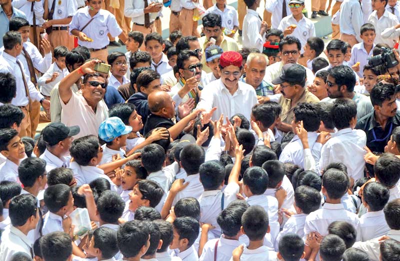 the cm s whirlwind visit included a visit to his alma mater where he met students and heard their problems photo online