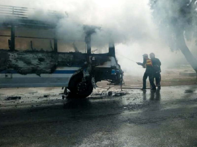 unidentified people set the bus involved in accident on fire photo express unidentified people set the bus involved in accident on fire photo express