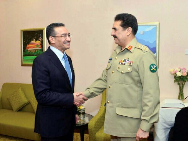 gen raheel shakes hands with the malaysian defence minister photo ispr gen raheel shakes hands with the malaysian defence minister photo ispr