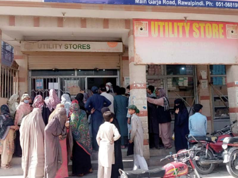 a large number of citizens line up to buy goods at a utility store in rawalpindi photo express