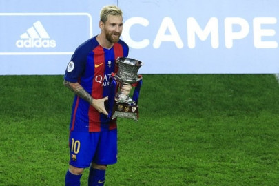 messi leads barcelona to super cup victory