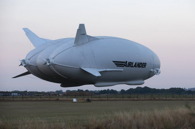 the hybrid air vehicles hav 304 airlander 10 hybrid airship is seen landing after its maiden flight at cardington airfield near bedford north of london photo afp the hybrid air vehicles hav 304 airlander 10 hybrid airship is seen landing after its maiden flight at cardington airfield near bedford north of london photo afp