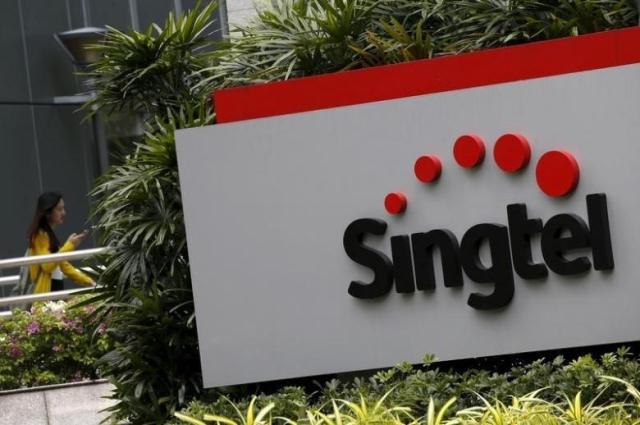 singtel southeast asia 039 s biggest telecom group by revenue will acquire 21 per cent of intouch photo source reuters