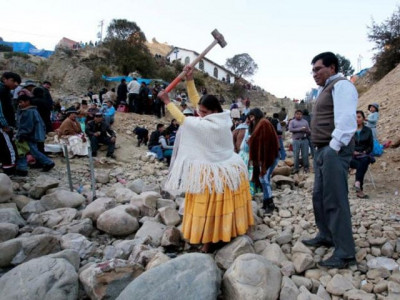 bolivian catholics break rocks to change fortunes bolivian catholics break rocks to change fortunes