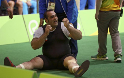 iranian weightlifter protests jury s decision as riot police called