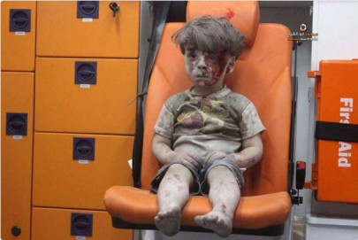 heartbreaking photo of syrian boy draws attention to aleppo heartbreaking photo of syrian boy draws attention to aleppo