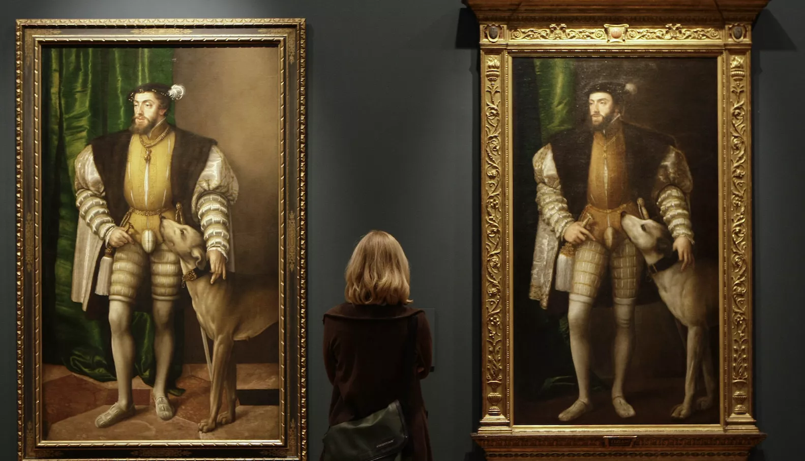 a woman looks at paintings titled quot carlos v con un perro quot by austrian artist jacob seisenegger photo reuters a woman looks at paintings titled quot carlos v con un perro quot by austrian artist jacob seisenegger photo reuters