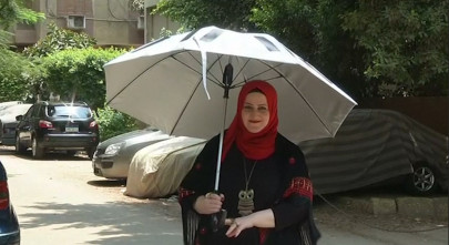 solar powered umbrella offers pilgrims relief