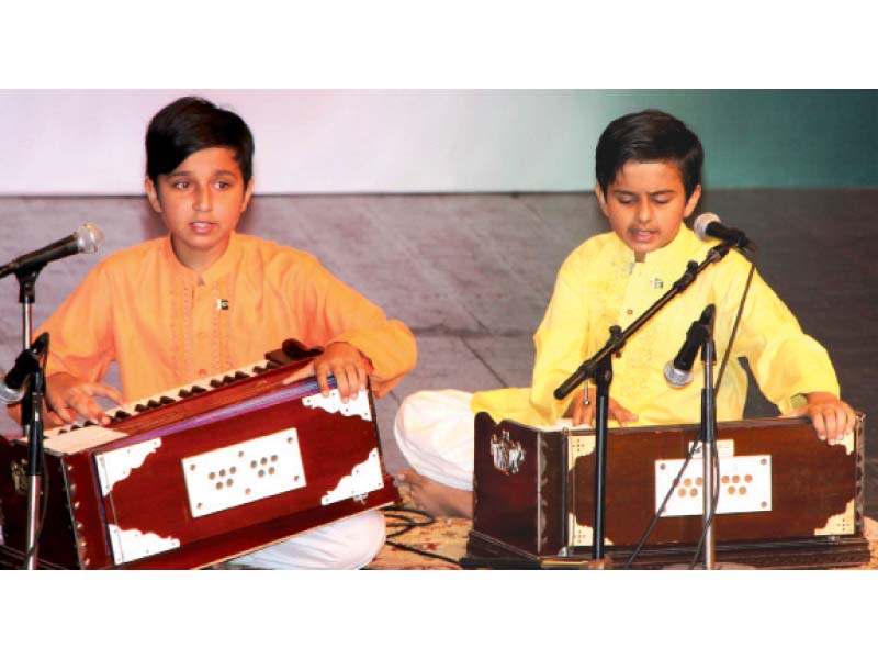 children performing at a cultural show organised by the pakistan national council of the arts as part of the independence day celebrations photo express