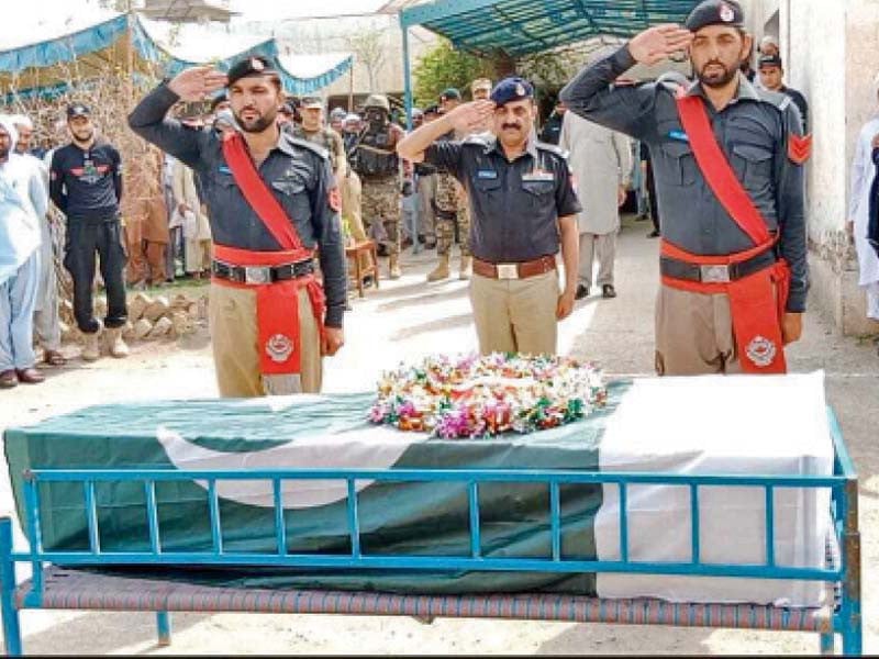 the last rites of the slain policeman were offered at tank police lines photo express