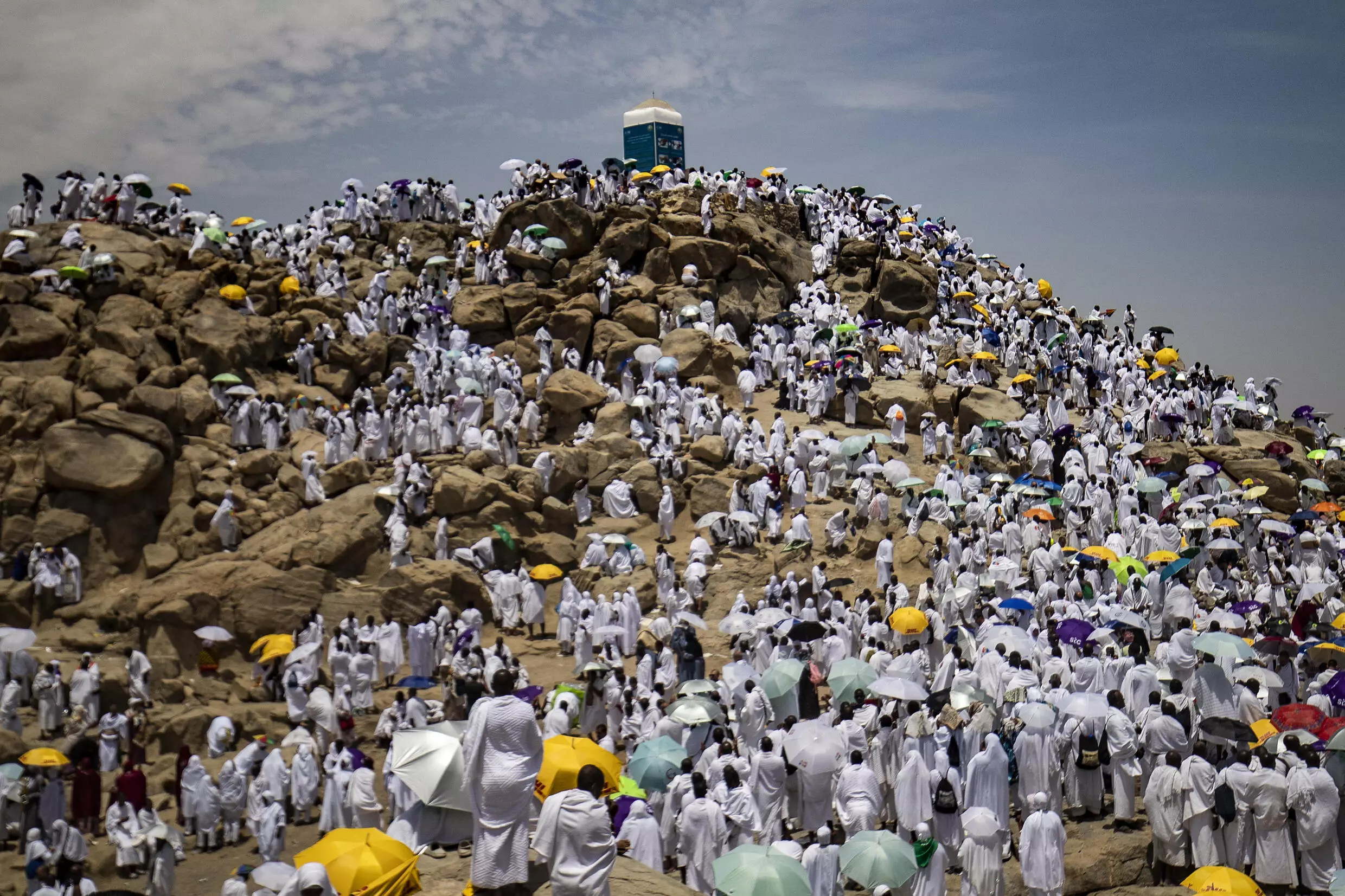 Muslim pilgrims gather atop Mount Arafat, southeast of the holy city of Mecca. This year, participation was capped at almost one million fully vaccinated worshippers. AFP