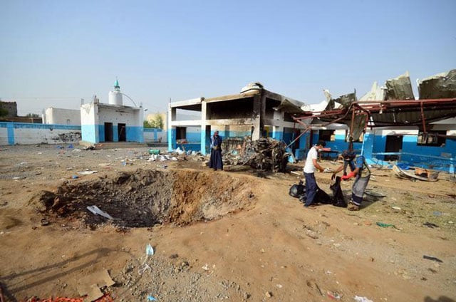 workers collect human remains at the yard of a hospital operated by medecins sans frontieres after it was hit by a saudi led coalition air strike in the abs district of hajja province yemen august 16 2016 photo reuters workers collect human remains at the yard of a hospital operated by medecins sans frontieres after it was hit by a saudi led coalition air strike in the abs district of hajja province yemen august 16 2016 photo reuters