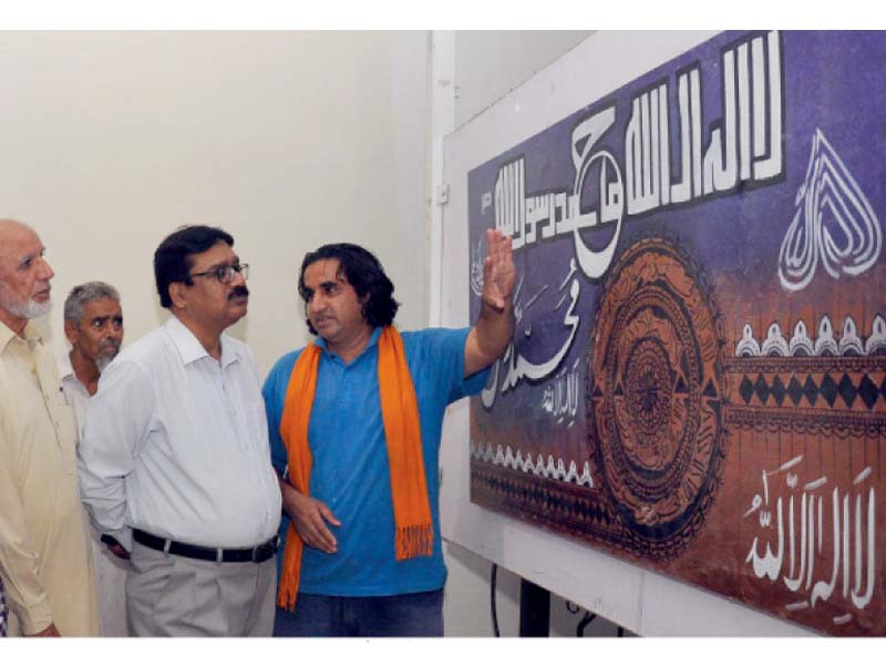 the artwork on islamic calligraphy is on display at the rawalpindi arts council photos express