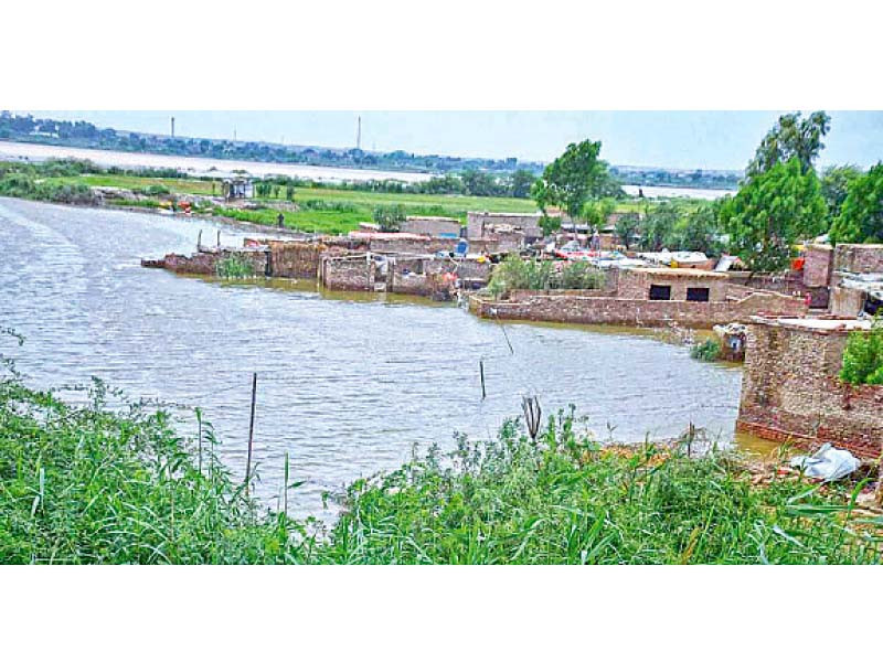 water from the indus river has entered a housing society illegally built along the riverbank photo nni